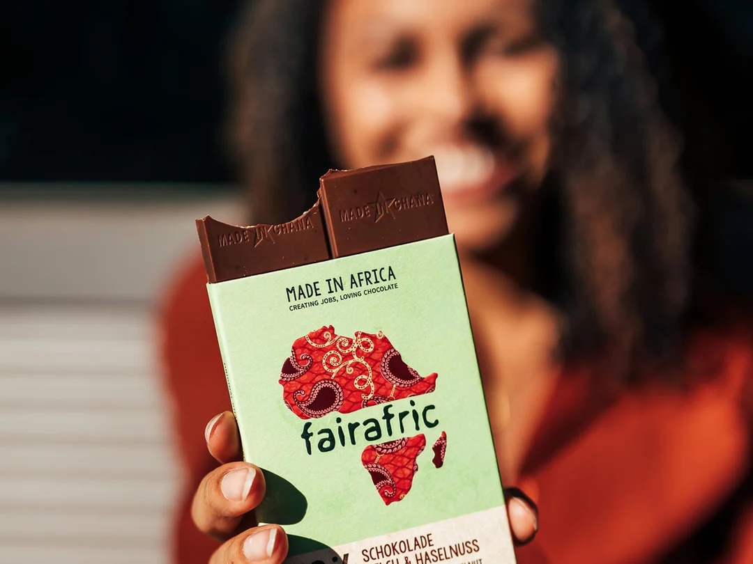 woman holds fairafric chocolate